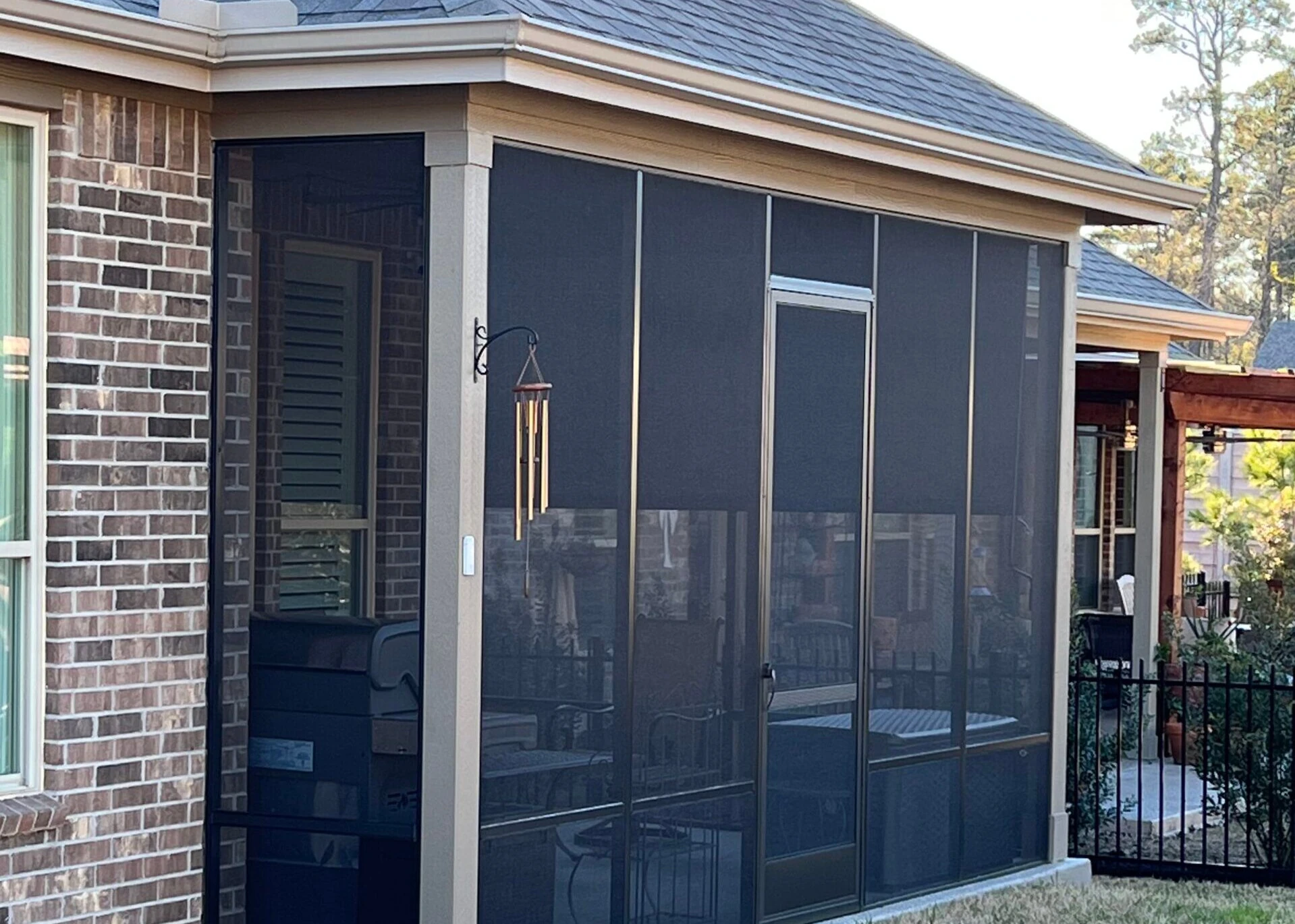 Fixed screen patio enclosure on a Houston home